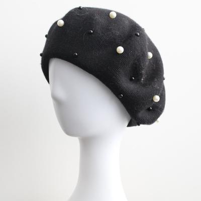 China COMMON winter warm angora hat for women knitted hat bead embellish beret hat for sale