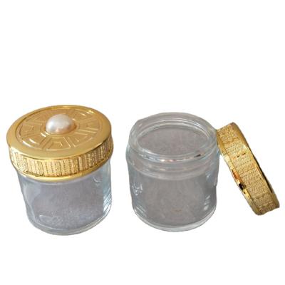 China Personal Care Dubai Stigma Croci Overgild Glass Bottle 5-10g Convenient Packing Small Round Seal Jar for sale