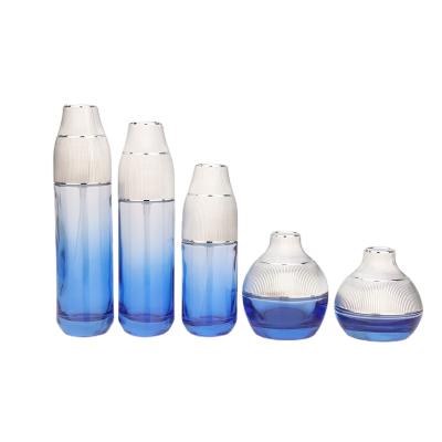 China Personal Care Top Grade Cosmetic Bottle Set Cream Water Face Cream Free Sample OEM ODM Glass Cosmetic Bottle for sale