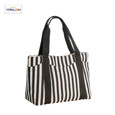 China Fashion PORTABLE European and American women bag stripe canvas bag women's hand bill of lading shoulder bag for sale