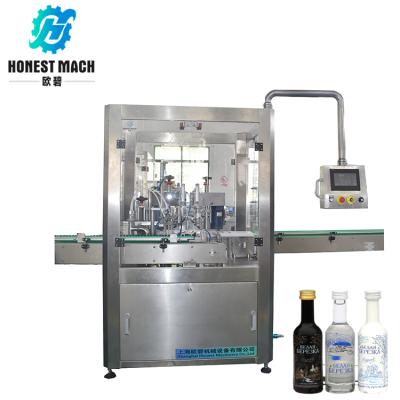 China automatic food bottle small vodka filling machine, vodka filling machine with price for sale