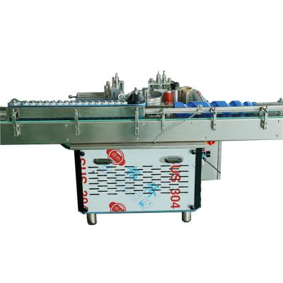 China Automatic food double heads wet glue labeling machine for sale, wet glue labeling machines for flat bottle for sale