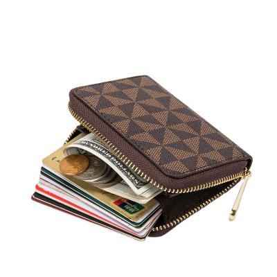 China Trendy new fashion PU male and female credit card holder, protected RFID zipper organ holder, large capacity card bag for sale