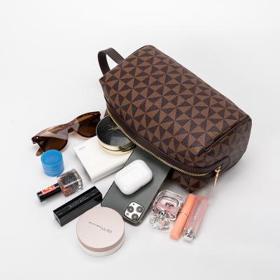 China Fashion Storage Bag Small Daily Items Durable Cosmetic Storage Bag Lady Bags Office Handbag for sale