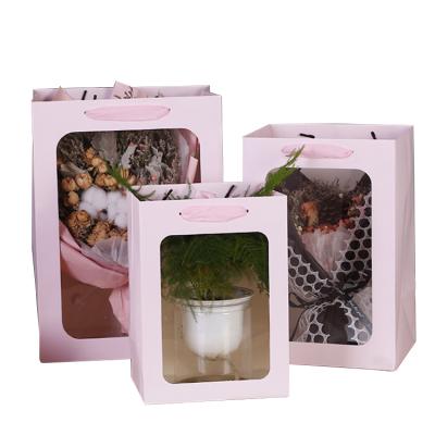 China Recyclable Paper Bags Flower Kraft Paper Bag Flower Paper Bag Valentine's Day for sale