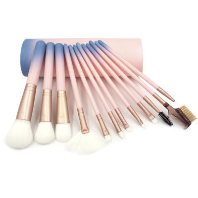 China 12pcs Professional Wholesale Cosmetic Make Up Brush Set Makeup Brush Set With Cylinder Case en venta