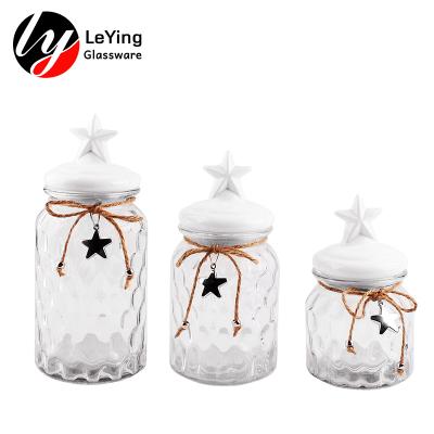 China Factory Price 260Ml 950Ml 1300Ml Star Shape Lid 3PCS Crystal Glass Storage Jar With Ceramic Lid Freshness Storage for sale