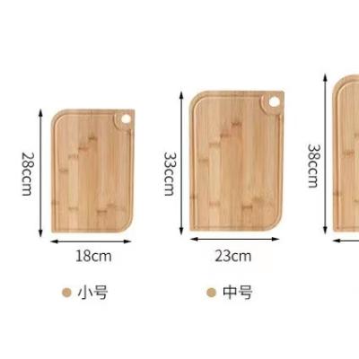 China Sustainable Walnut Cutting Board Personalized Kitchens Extra Thick Black Juice Groove Chopper 16 12 15 Inches for sale