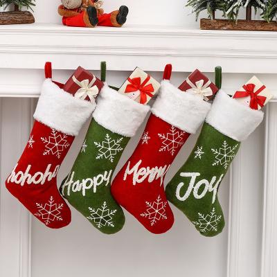 China Red and Green White Plush Christmas Party Decoration Merry Christmas Stockings and Family Bags Home Decorations for sale