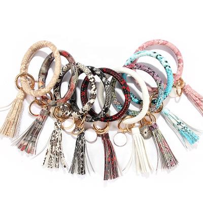 China Fashion PU Key Chain Pendant Key Chain Unisex Key Chain Bracelet Unisex Tassel Series Key Chain Bracelet for sale