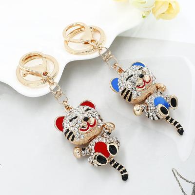 China Advertising Car Key Decoration Crystal Tiger Keychain Lovely Handbag Promotion Decoration for Women and Girls for sale