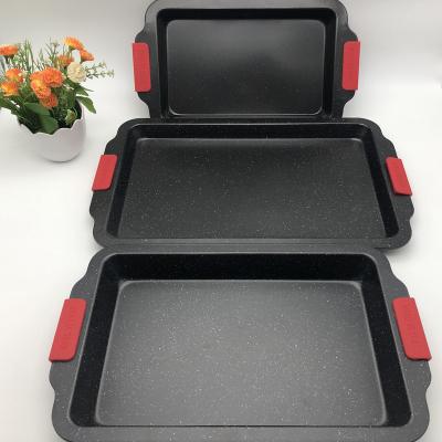 China Disposable Cake Pan Carbon Steel Baking Pan Marble Non-Stick Coating With Silicone Handle for sale