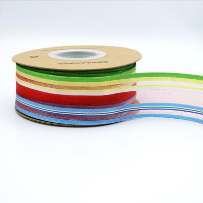 China Eco-Friendly Hot Sale Wedding Christmas Birthday Multicolor And Glitter Gold Organza Shiny Double Sided Satin Ribbon Rolls for sale