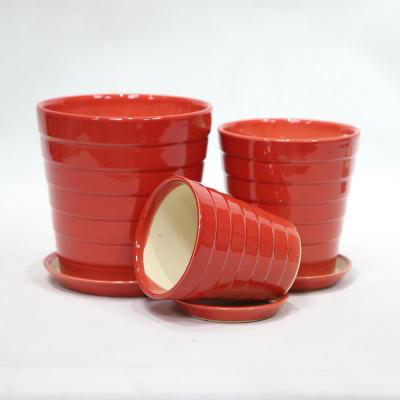 China Round Lightweight Ceramic Planters With Drainage Hole for sale