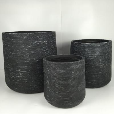 China Modern And Versatile Fiber Clay Planter For Both Indoor And Outdoor Plant Display for sale