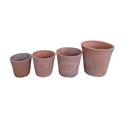 China Durable Fiber Clay Planter with Hand Carved Finish for sale