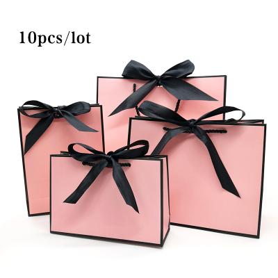 China Recyclable 5kg 10kg Bolsas in Pink Sri Lanka Singapore Gift Wrapping Paper Paper Bags Printed Logo With String Ribbon Handle Luxury for sale