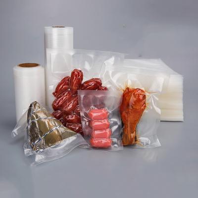 China Moisture Proof Custom Design Bpa Free Transparent Plastic Food Commercial Vacuum Roll Sealed Bags For Food for sale