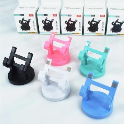 China Universal Promotional Gifts 360 Rotating Dashboard Car Phone Holder Stand With Custom Logo for sale