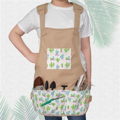 China Waterproof Durable Canvas New Design Garden Tool Apron With Pocket for sale