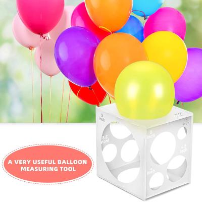 China Gift Toy 9 Holes Balloon Sizer Boxed Cube Balloon Size Folding Plastic Measuring Tool For Balloon Decorations for sale