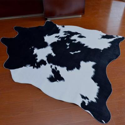 China 140*200cm Eco-friendly Cow Animal Skin Blankets Faux Fur Cowhide Blanket for sale