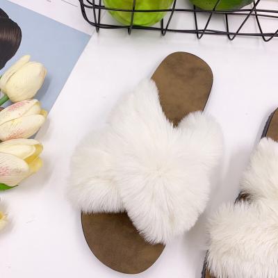 China Soft wholesale furry women's slippers for sale