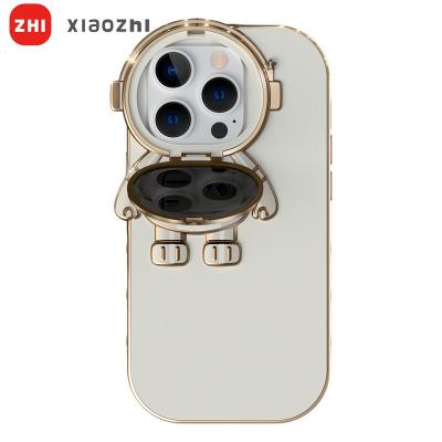 China Latest Design Shockproof Astronauts Cover 3D Cartoon Clamshell Socket Mobile Phone Covers Plated Phone Cover Phone Accessories for sale