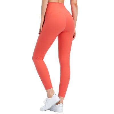 China New Women's Breathable Nude Yoga Pants Without The Line High Lift Tight Stretch Hip Waist Small Foot Fitness Embarrassment Pants for sale