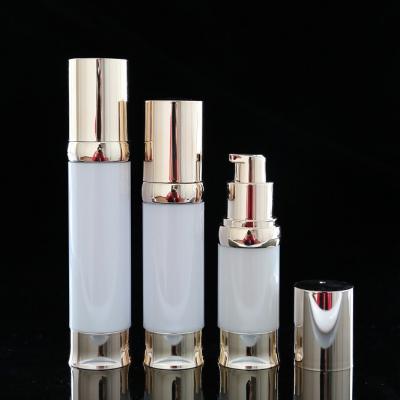 China Household Products Metal Gold Serum Airless Pump Cosmetic Bottles 15ml 30ml 50ml for sale