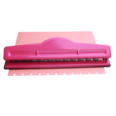 China Office Desk Metal Stationery Customized Mushroom Shape Hole Punch for sale