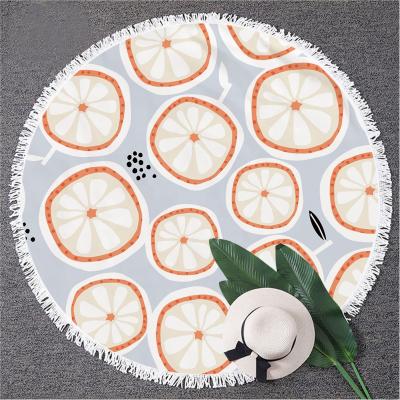 China Viable custom printed microfiber high quality sand sublimation round pom pom free quick dry summer beach towel for sale