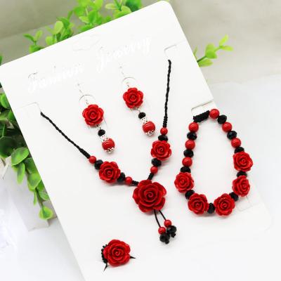 China High Quality New Fashion Beaded Jewelry Sets Elastic Ring Rose Flower Pendant Necklace Adjustable Ladies Handmade Braided Earrings Bracelet for sale