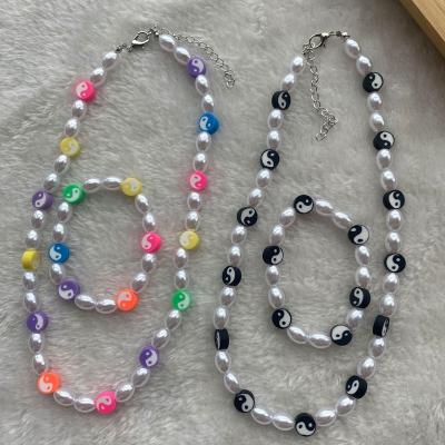 China New Arrival High Quality Simple Faux Pearl Beaded Necklace Bracelet Jewelry Set Retro Polymer Multi Color Yin Yang Stretch Bracelet Necklace for sale