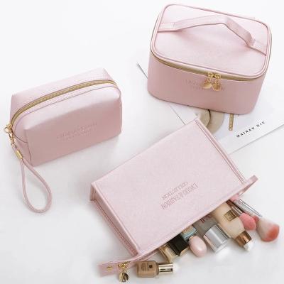 China Private Travel Toiletry Bag Logo PU Leather Pink Portable Cosmetic Toiletry Bag for sale