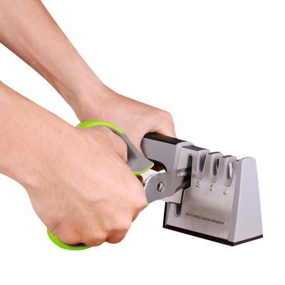 China Viable Multifunctional Four-stage Non-slip Plastic Knife Sharpener Kitchen Knife Sharpener Silicone Handle Chef Knife Sharpener for sale