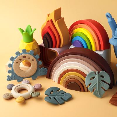 China Free Sample OEM ODM Non-Toxic Silicone Stacking Toy Organic Silicone Baby Silicone Teether Rainbow Teething Toys for sale