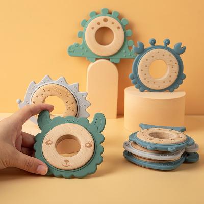 China 2022 New Toddler's Bpa Free Silicone and Natural Beech Wooden Teether Toy Organic Baby Teething Ring Non-Toxic for sale