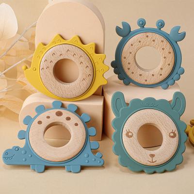 China Baby Soft Toy Hot Eco Organic BPA Free Funny Animal Chew Teething Toy Soft Silicone And Beech Wooden Teether for sale