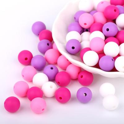 China Toy New soft wholesale low price necklace baby diy silicone beads printed round beads teething 15mm for sale