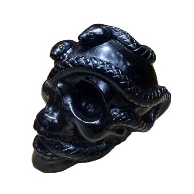 China Stone Serpent Crystal Black Obsidian Skulls Healing China Crystal Skulls Head Folk Crafts with Serpent for fengshui home decoration for sale