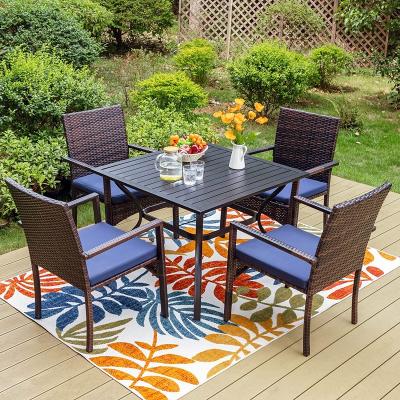 China Hot selling modern dining table rattan dining set with cushions rattan table and chairs 5 pieces set high quality for sale