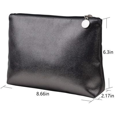 China Normcore/Coin Bag Soft Handmade Leather Makeup Bag Women's Travel Purse Factory Custom Minimalist Cosmetic Bag For Gift for sale