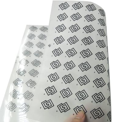 China Eco-friendly OEM Screen Printing Heat Transfer Logo Glitter Reflective Ribbon Fabric Washable Custom High Light Reflective Labels For Clothes for sale