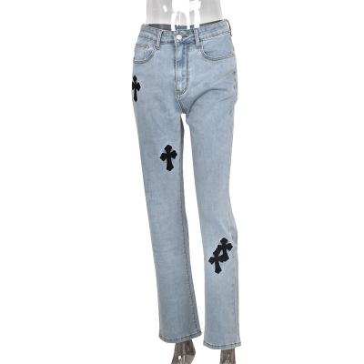 China 2022 New Fashion QUICK DRY Women's Mid Waist Cross Printed Friend Style Street Skinny Jeans for sale