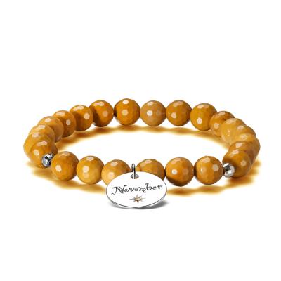 China Crystal RINNTIN GMB11 Faceted Natural Yellow Mookaite Beads 8mm 7.5 inch Silver Stretch Bracelet for sale