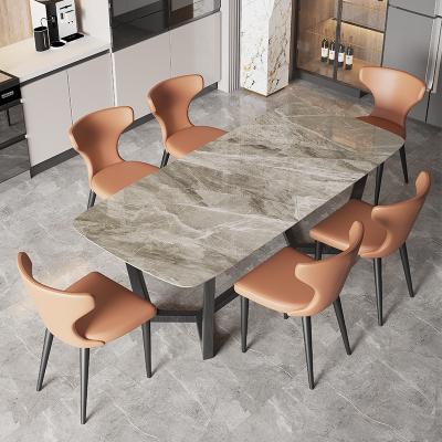 China Modern luxury home expandable china furniture metal chipboard top expandable stone dining table supplier factory company company for sale