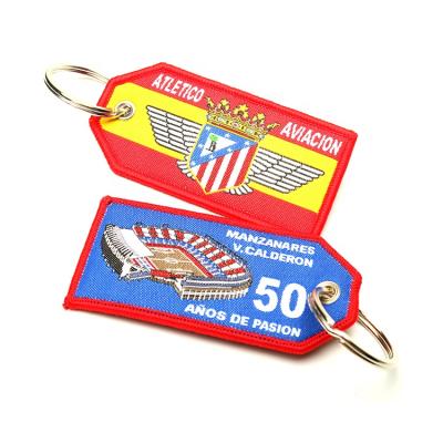 China Double Sided Logo Factory Price Custom Brand Machine Embroidery Woven Fabric Key Flag Key Chain For Promotion for sale