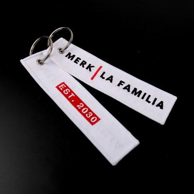 China Custom Embroidery Logo Keychains Embroidered Key Tags Metal Ring Tajima Digitizing Twill Cloth Souvenir Hot Selling Brand for sale