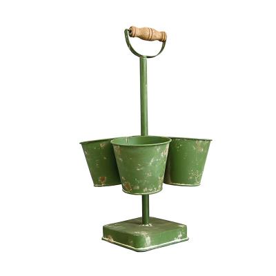 China Durable Metal Floor Material Outdoor Flower With Plant Stand Handle Balcony Flower Pot Farmhouse Decorative Flower Pot for sale